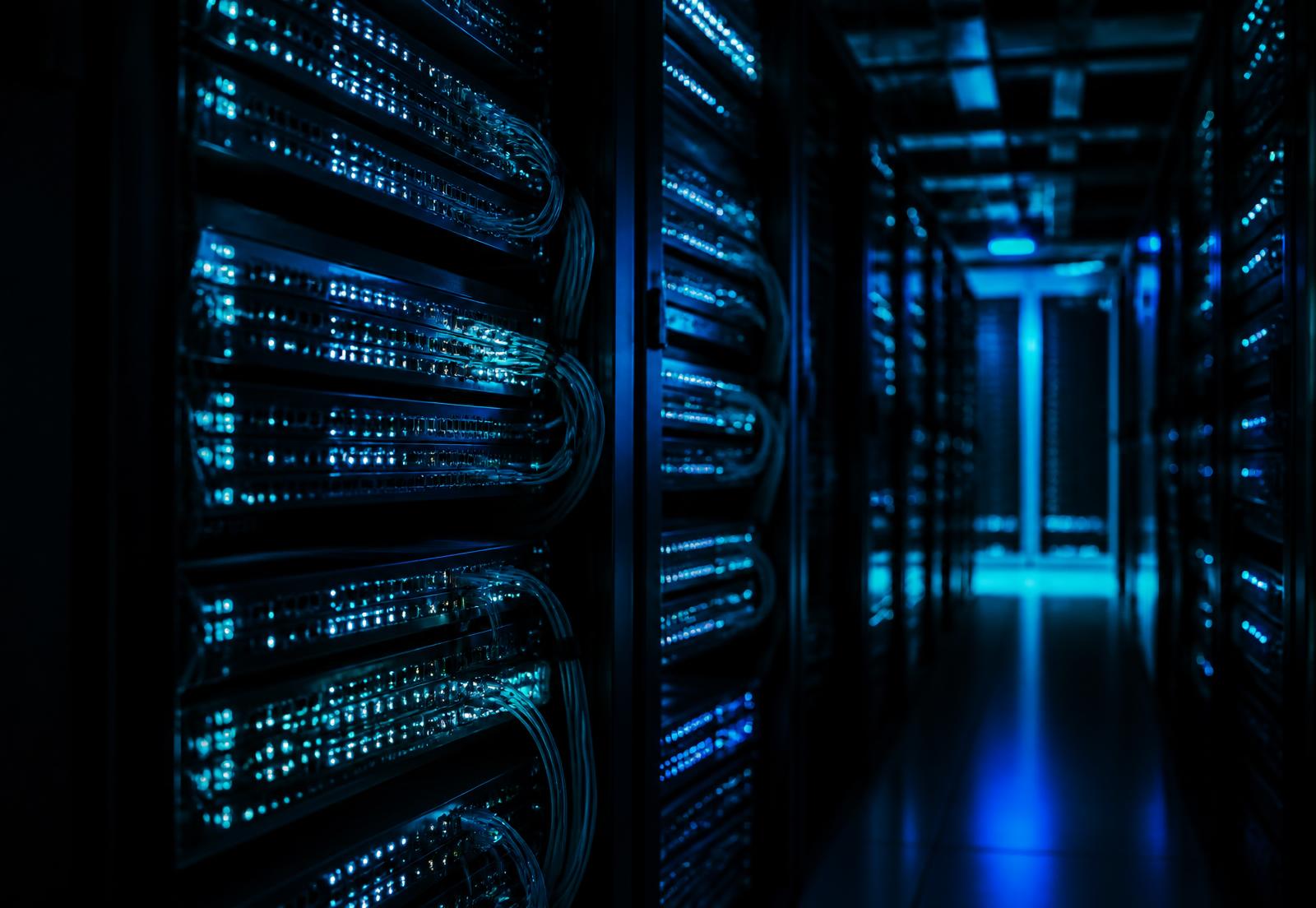 Enterprise network equipment illuminated inside a modern data center
